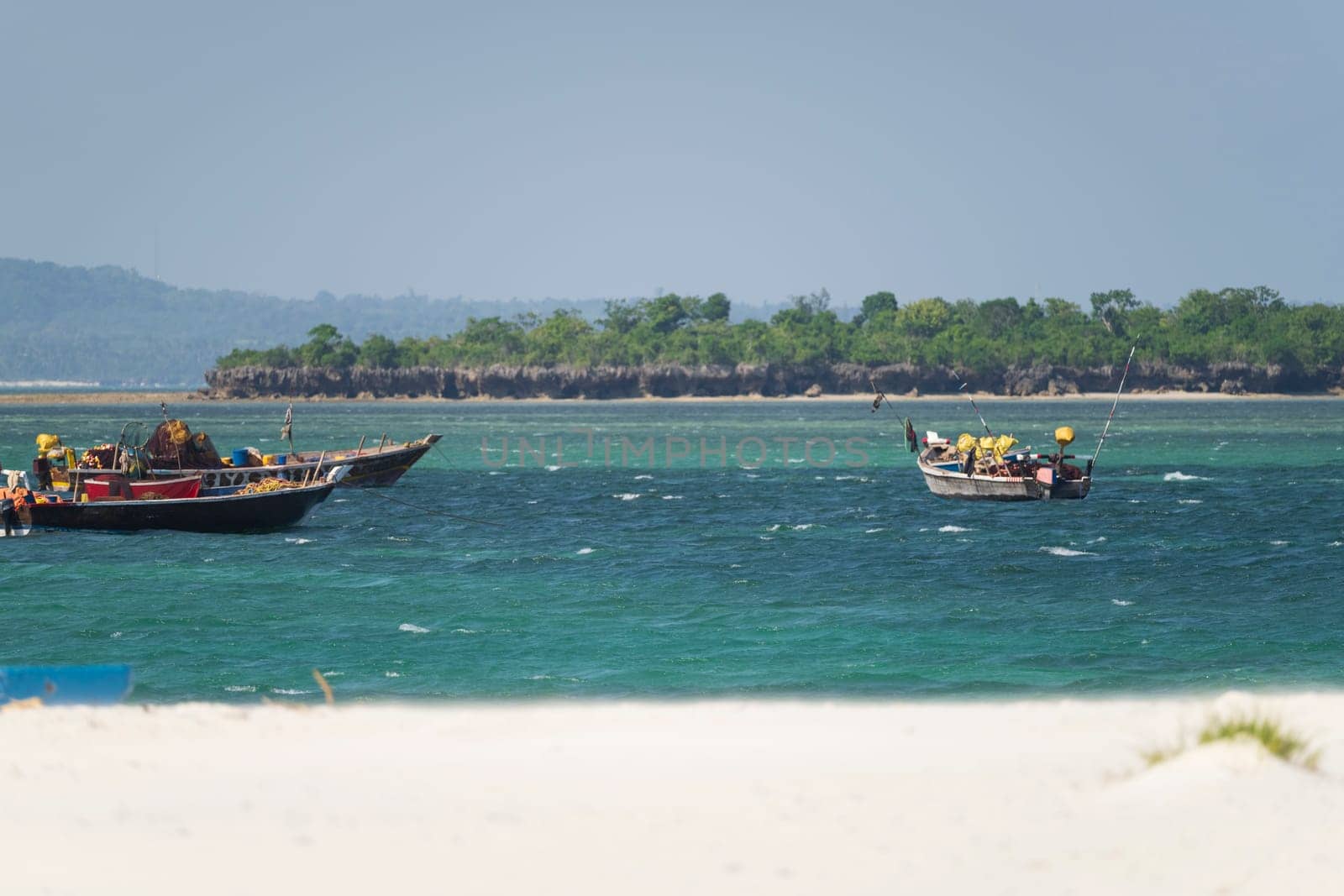 Fishing wooden boats moored near the beach at sunny day, Zanzibar,Tanzania Africa