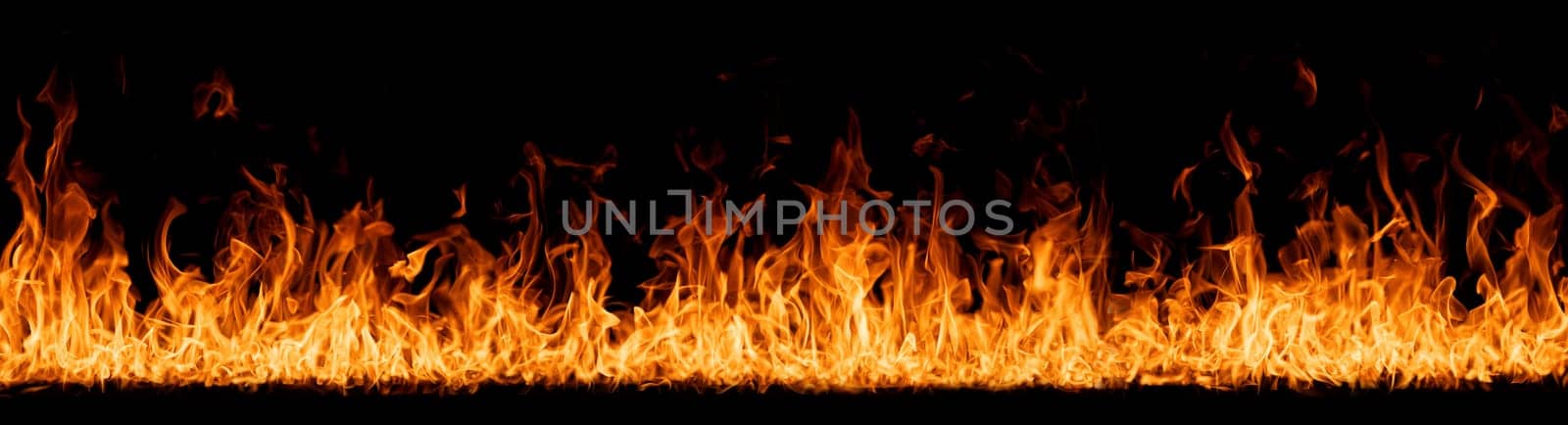 Hell flames, devil's mouth. fire banner. A background of scalding flames. Firestorm. Fire burning. Bright burning flames on a black background. Wall of Real fire, abstract background. Fire flames by EvgeniyQW