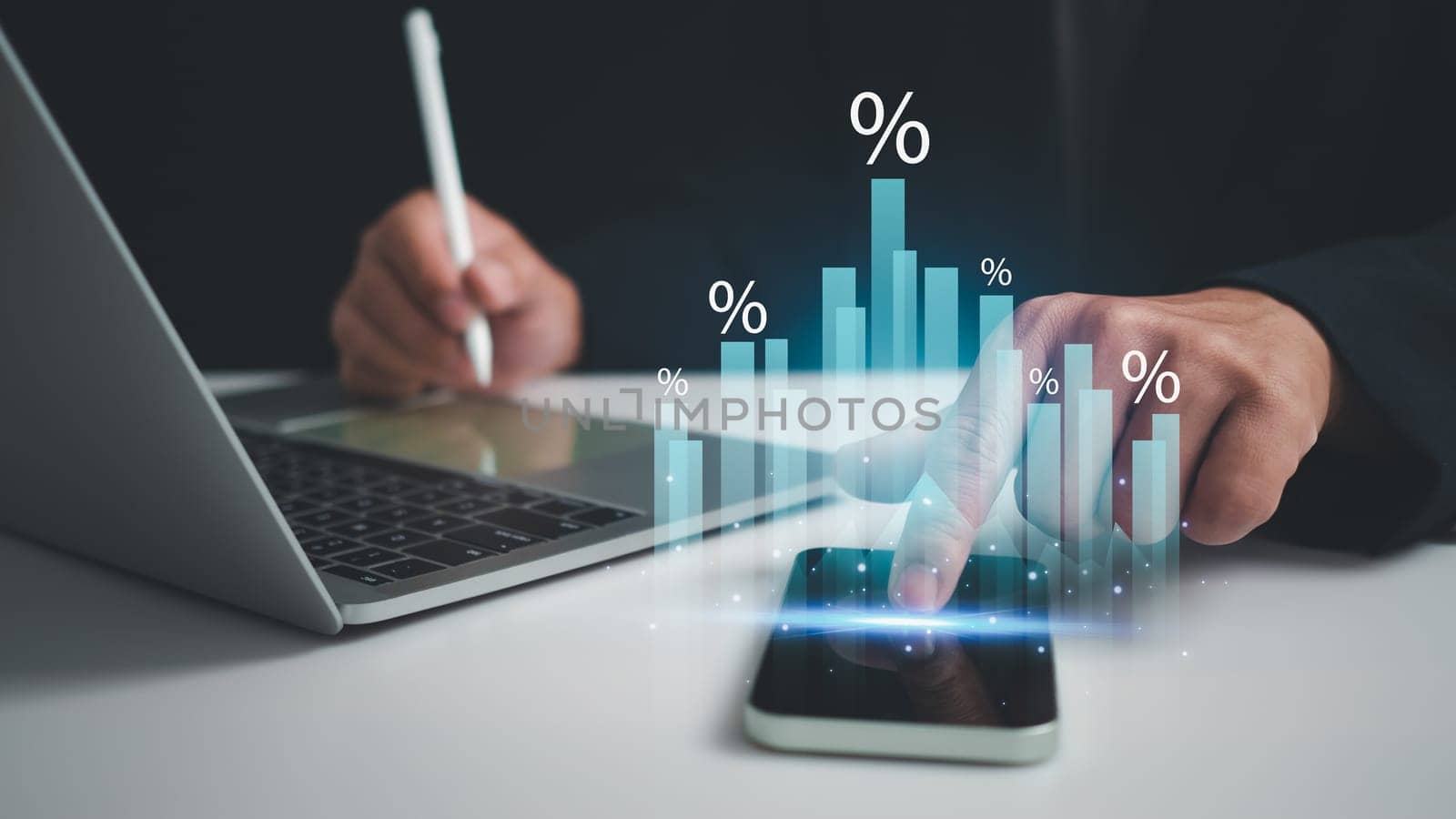 Business development concepts for success and growth. Businessman taps his finger on his phone to display a graph with percentage signs for the future growth plan of his organization. finance, management, plan, management, strategy, by Unimages2527