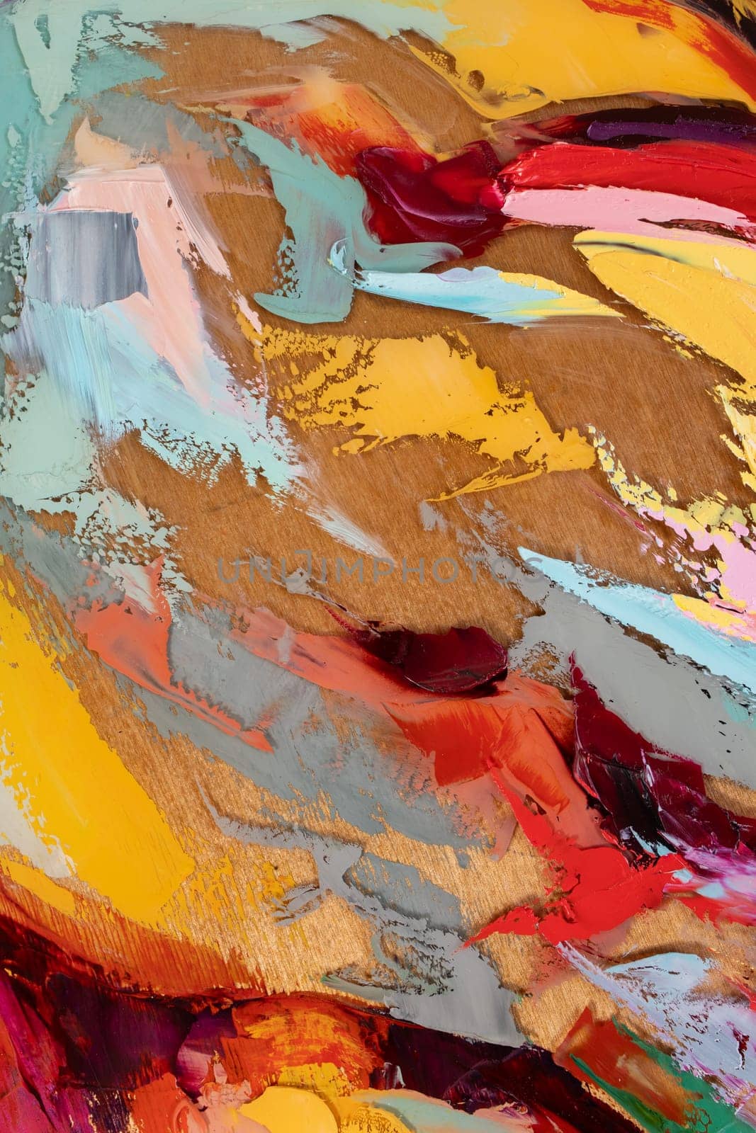 Fragment of multicolored texture painting on plywood. Abstract art background. oil on canvas. Rough brushstrokes of paint. Closeup of a painting by oil and palette knife. Highly-textured, high quality details.