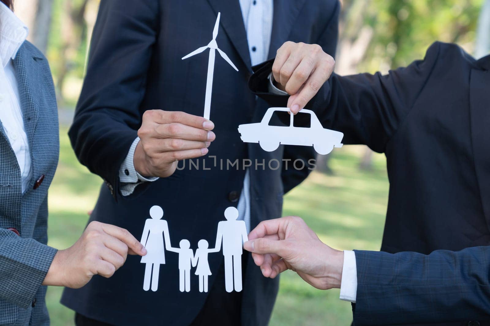 Business people holding ECO icon in nature. Gyre by biancoblue