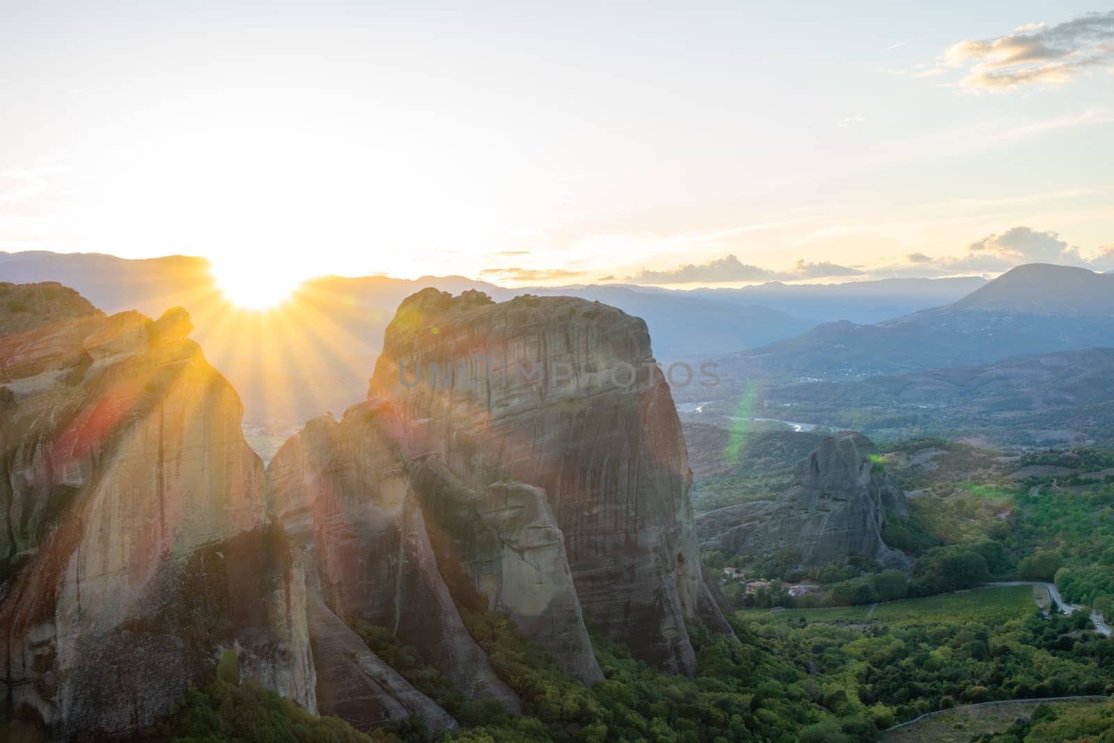 Summer Greece. Sunset over the tops of the rocks in the Meteora valley