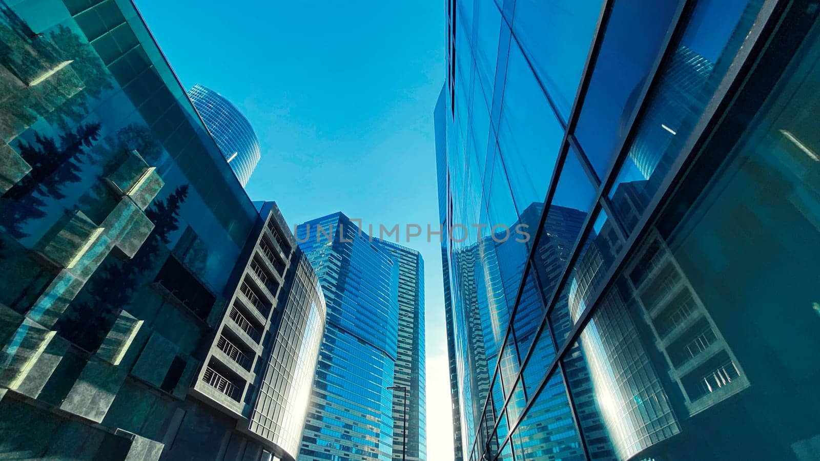 Office buildings. Skyscrapers in the business center. Modern architecture, glass facade of residential or commercial real estate