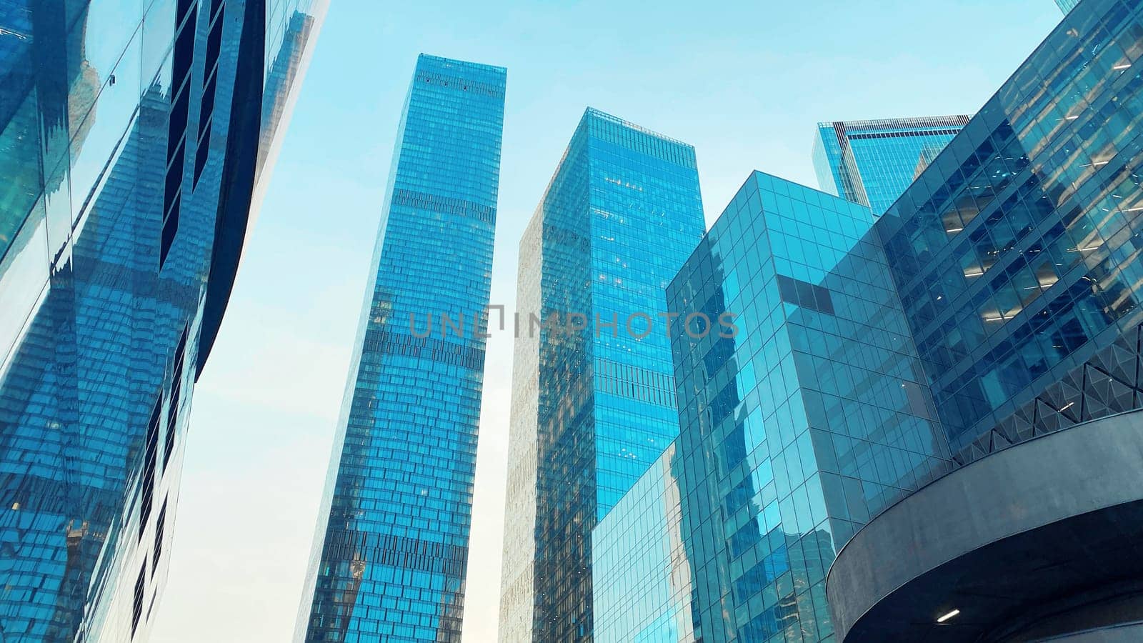Office buildings. Skyscrapers in the business center. Modern architecture, glass facade of residential or commercial real estate