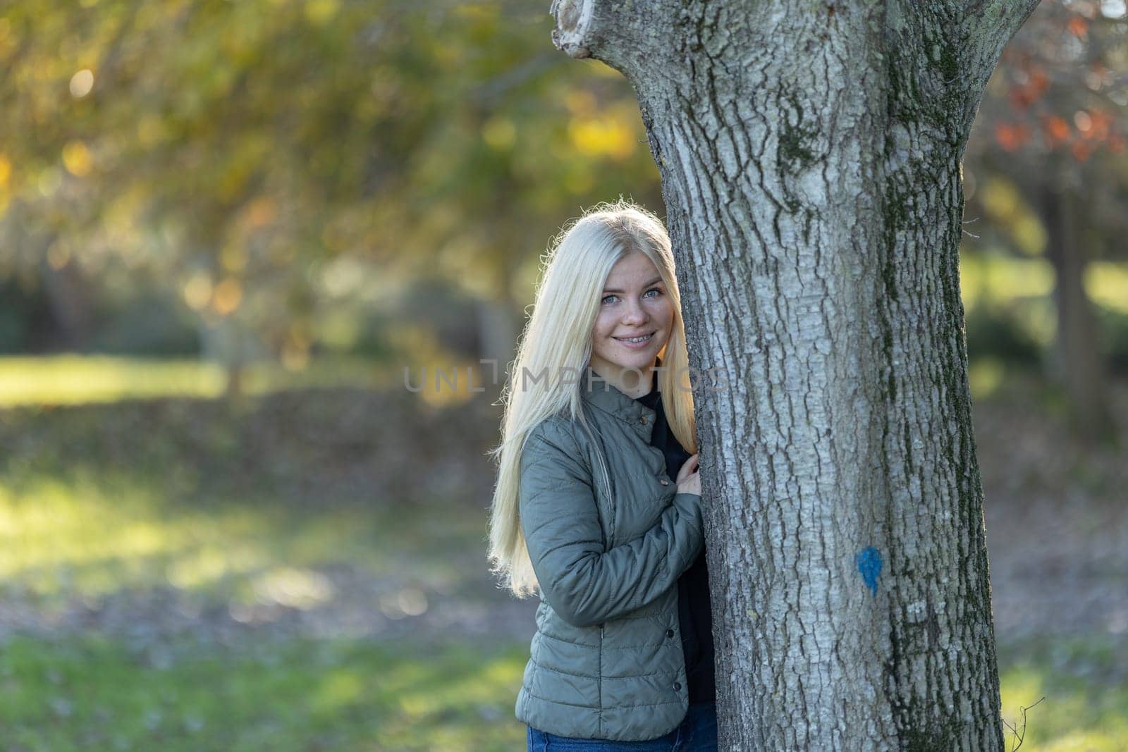 Woman with braces smiling Near Park Tree by Studia72