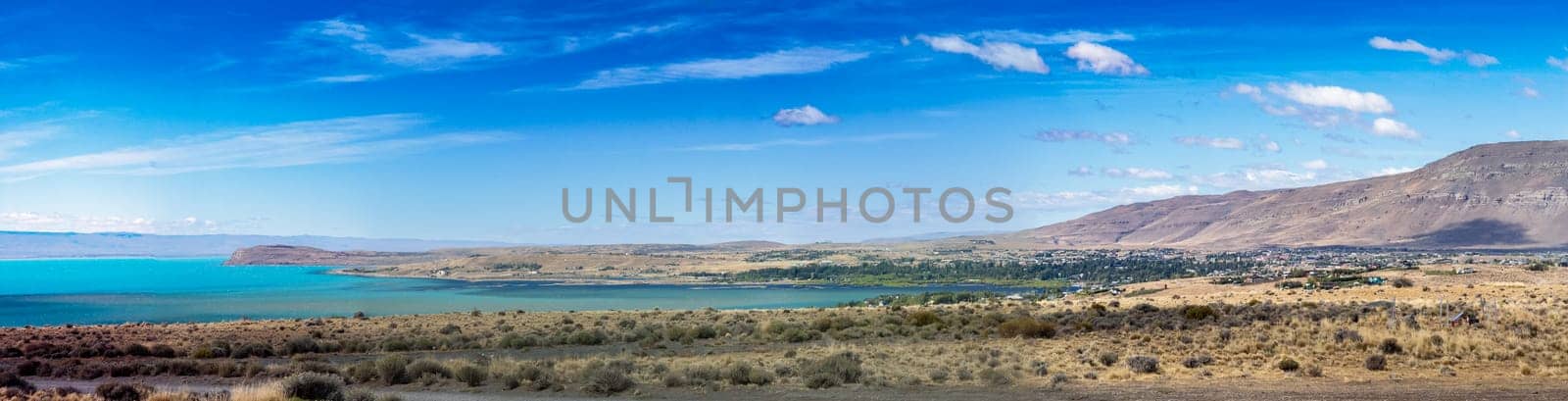 Scenic panoramic of El Calafate, Argentina with blue waters and mountains.