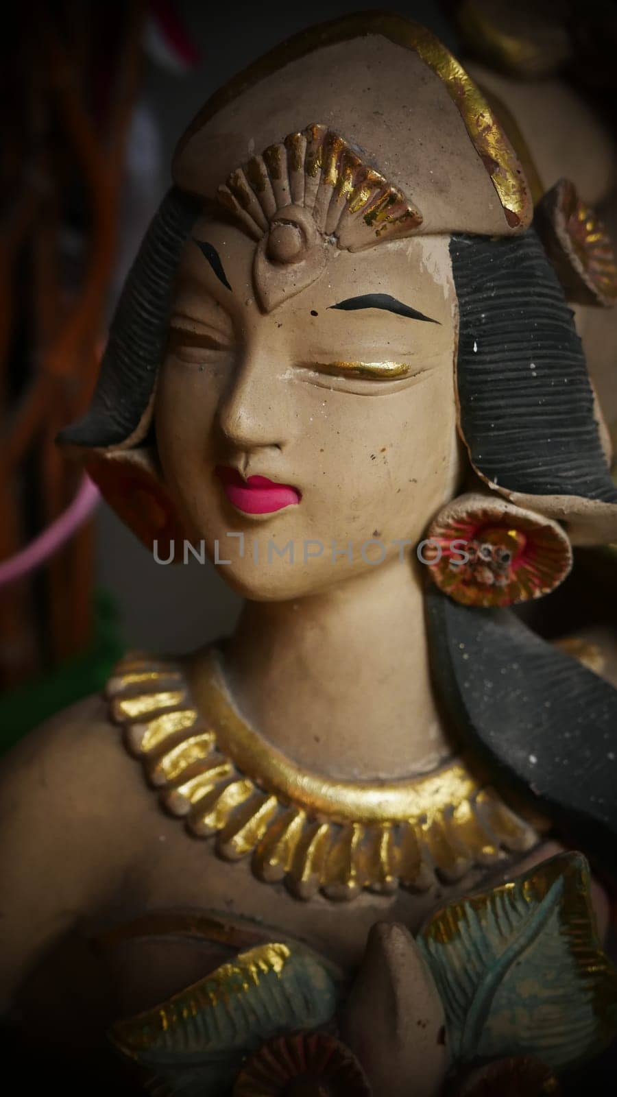 statue of a Balinese or javanese dancer used as garden gnome decoration, javanese gnome indonesia asian garden statue