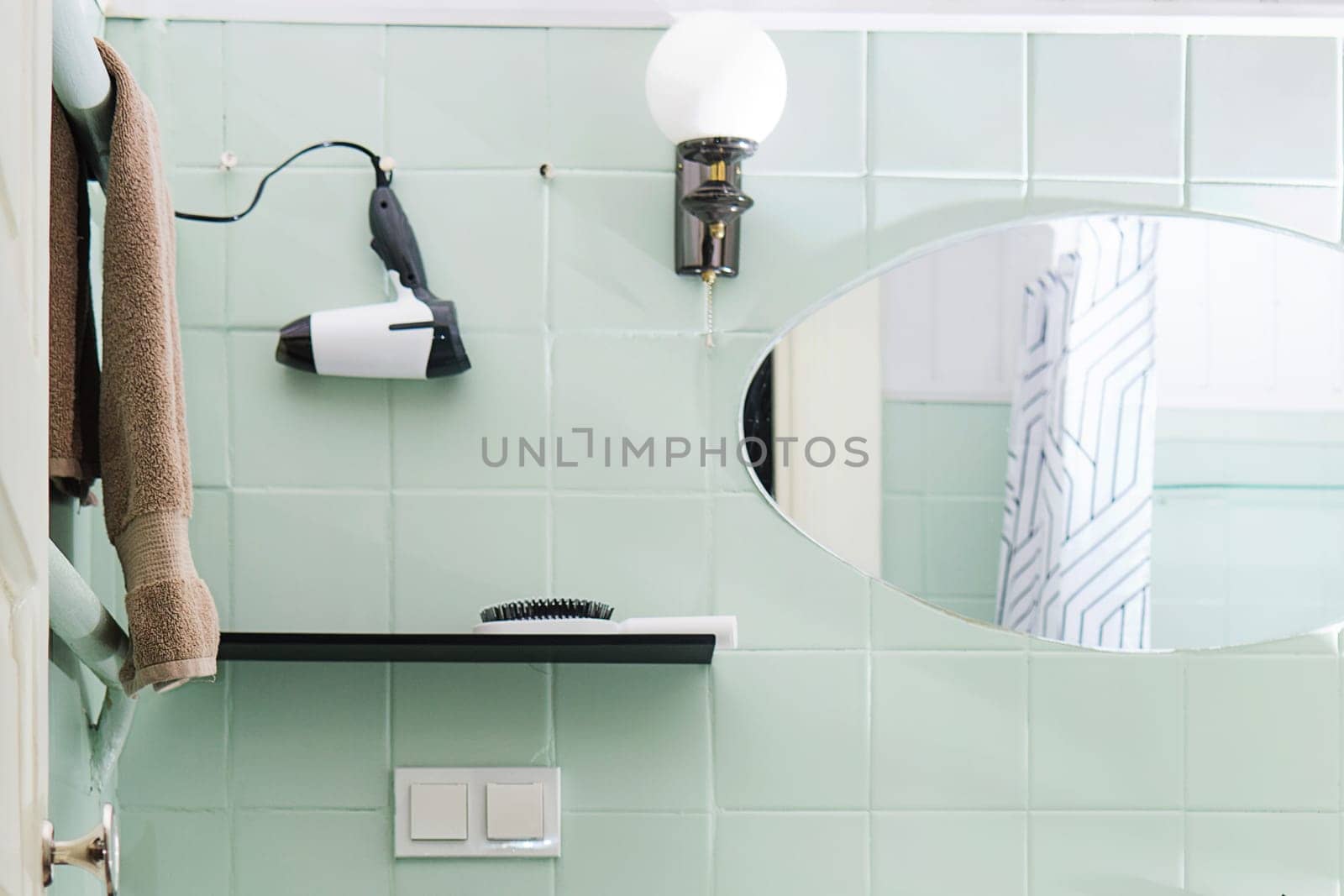 Budget bathroom interior in bright colors. Details of the bathroom interior