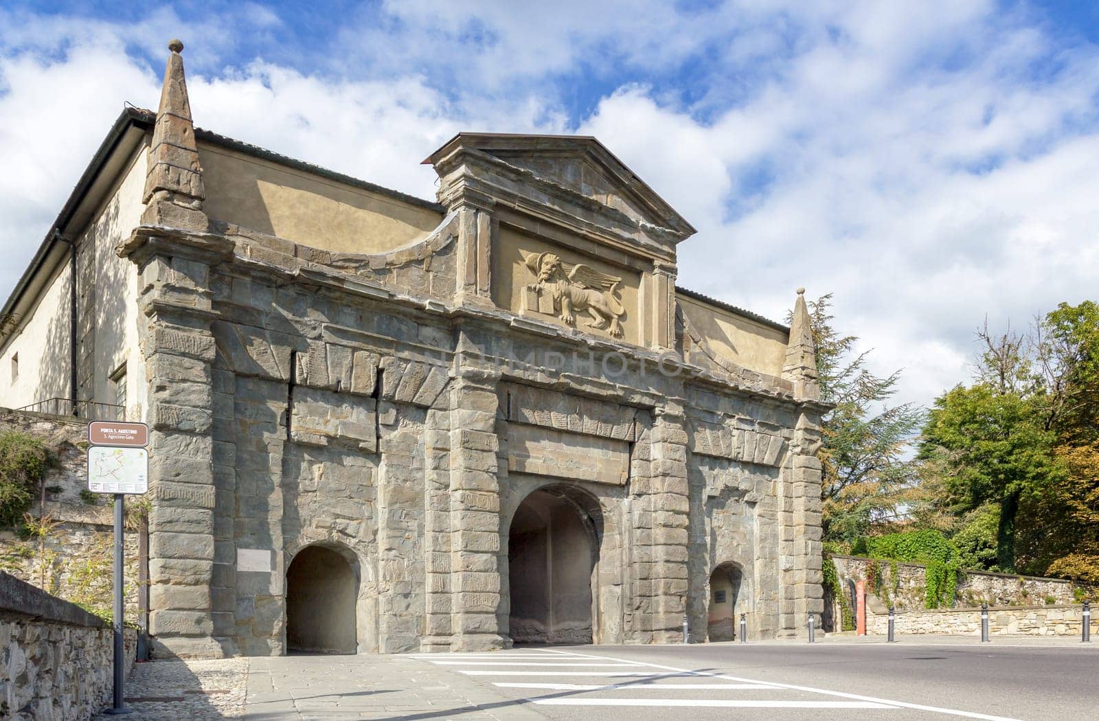 Sant'Agostino gate (Porta Sant’Agostino) is the main entrance to the Upper Town (Citta alta) and has the Lion of Saint Mark sculpted. European travel and historical and cultural tourism.. Bergamo, ITALY - January 5, 2024