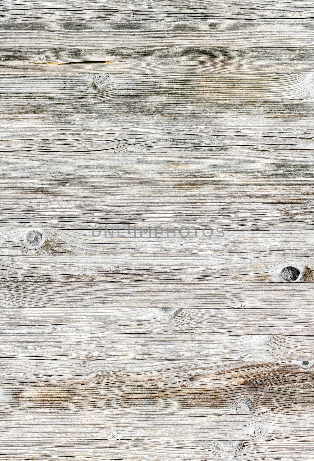 Brown and gray wood texture background coming from natural tree. The wooden panel has a beautiful dark pattern, hardwood floor texture.