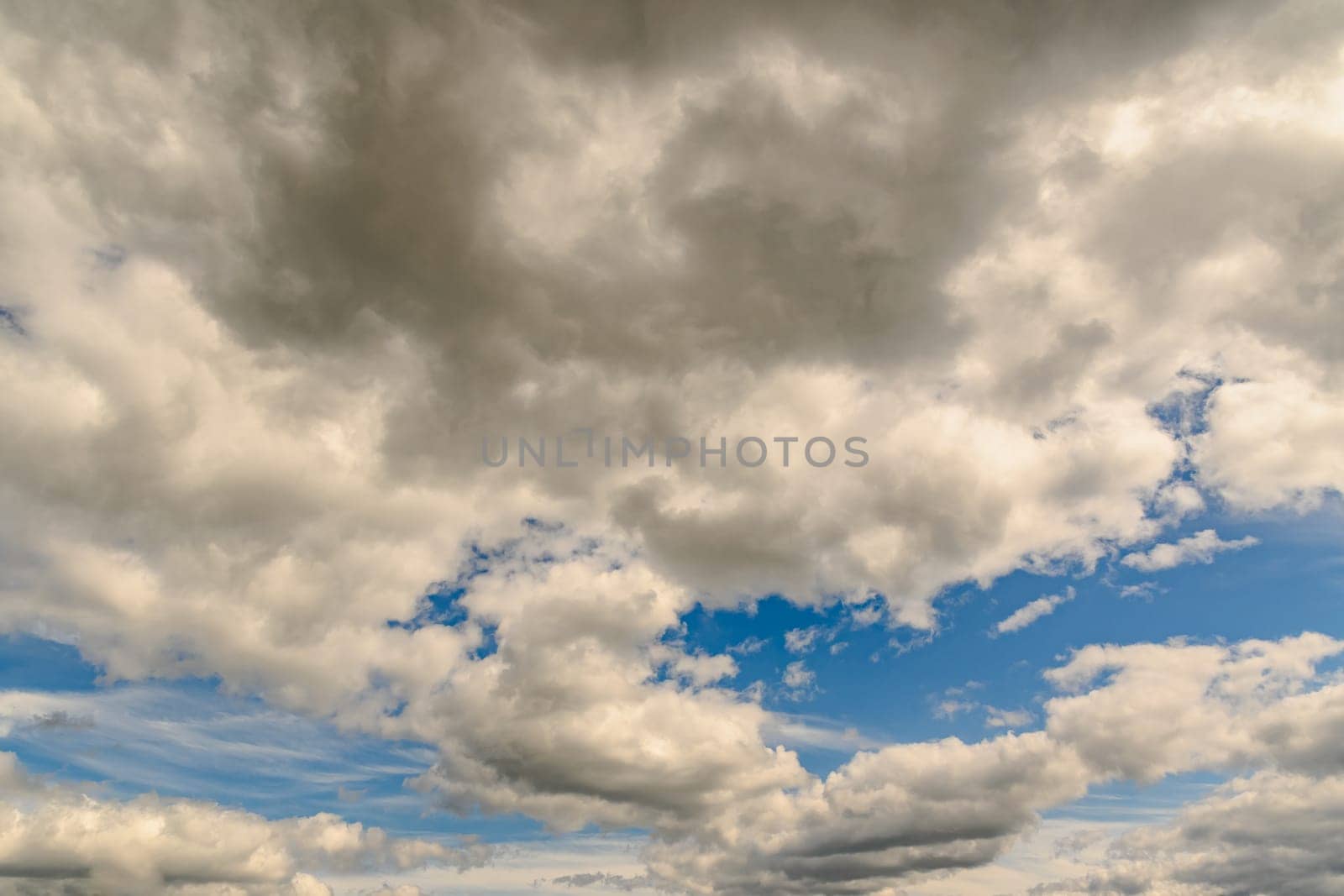 Photo of some white light clouds and cloudy blue sky landscape.5