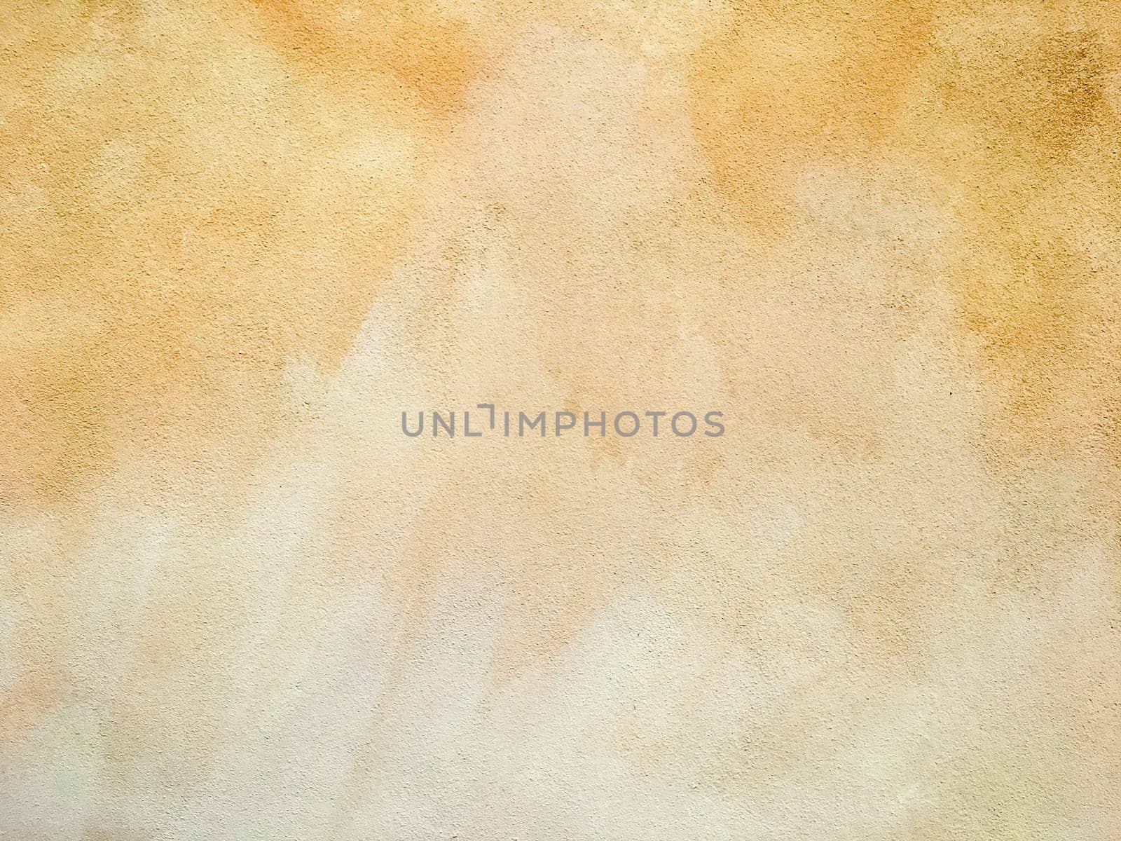 Concrete brown colorful wall surface texture. Abstract grunge bright illuminating color background. Copyspace.