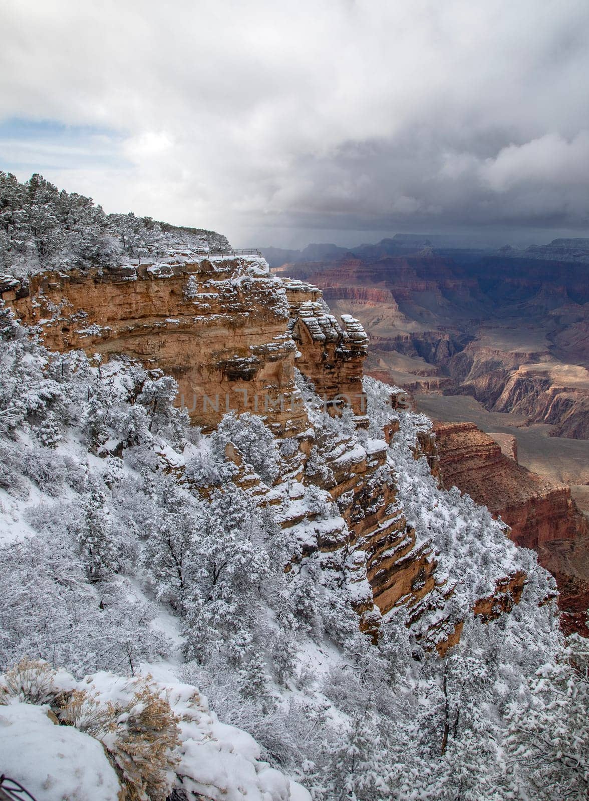 Fresh snow has fallen at the South Rim of The Grand Canyon at Grand Canyon National Park, Arizona