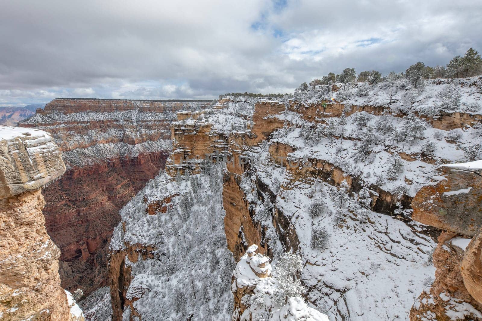 Fresh snow has fallen at the South Rim of The Grand Canyon at Grand Canyon National Park, Arizona