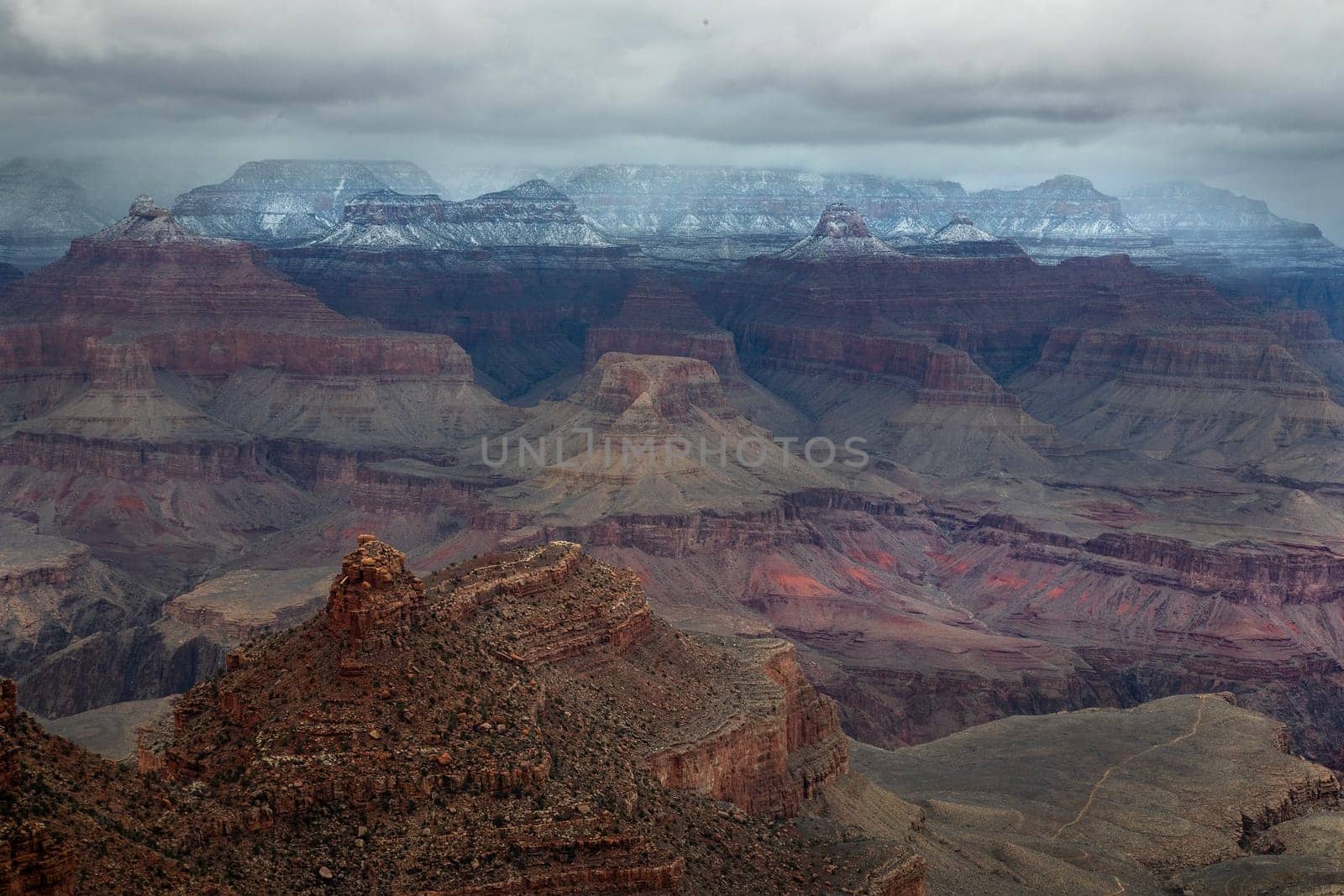 Fresh snow has fallen at the South Rim of The Grand Canyon at Grand Canyon National Park, Arizona
