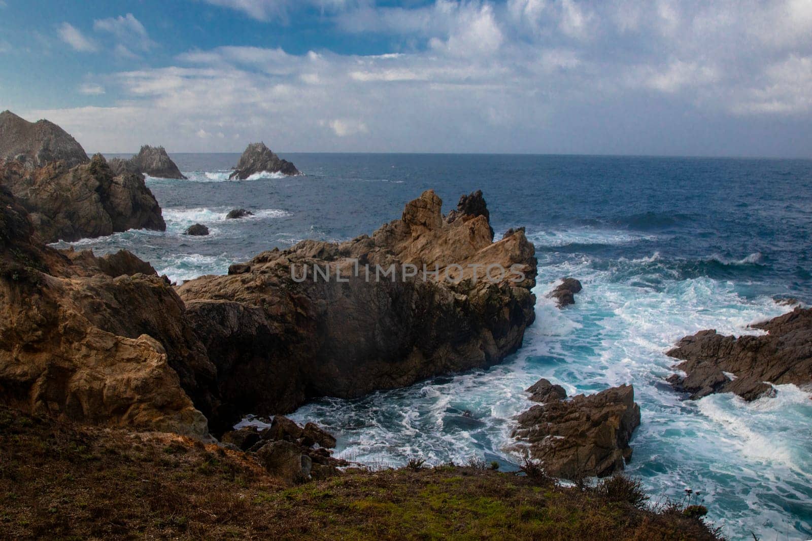 Waves crash along the coastline at Point Lobos State Natural Reserve in California