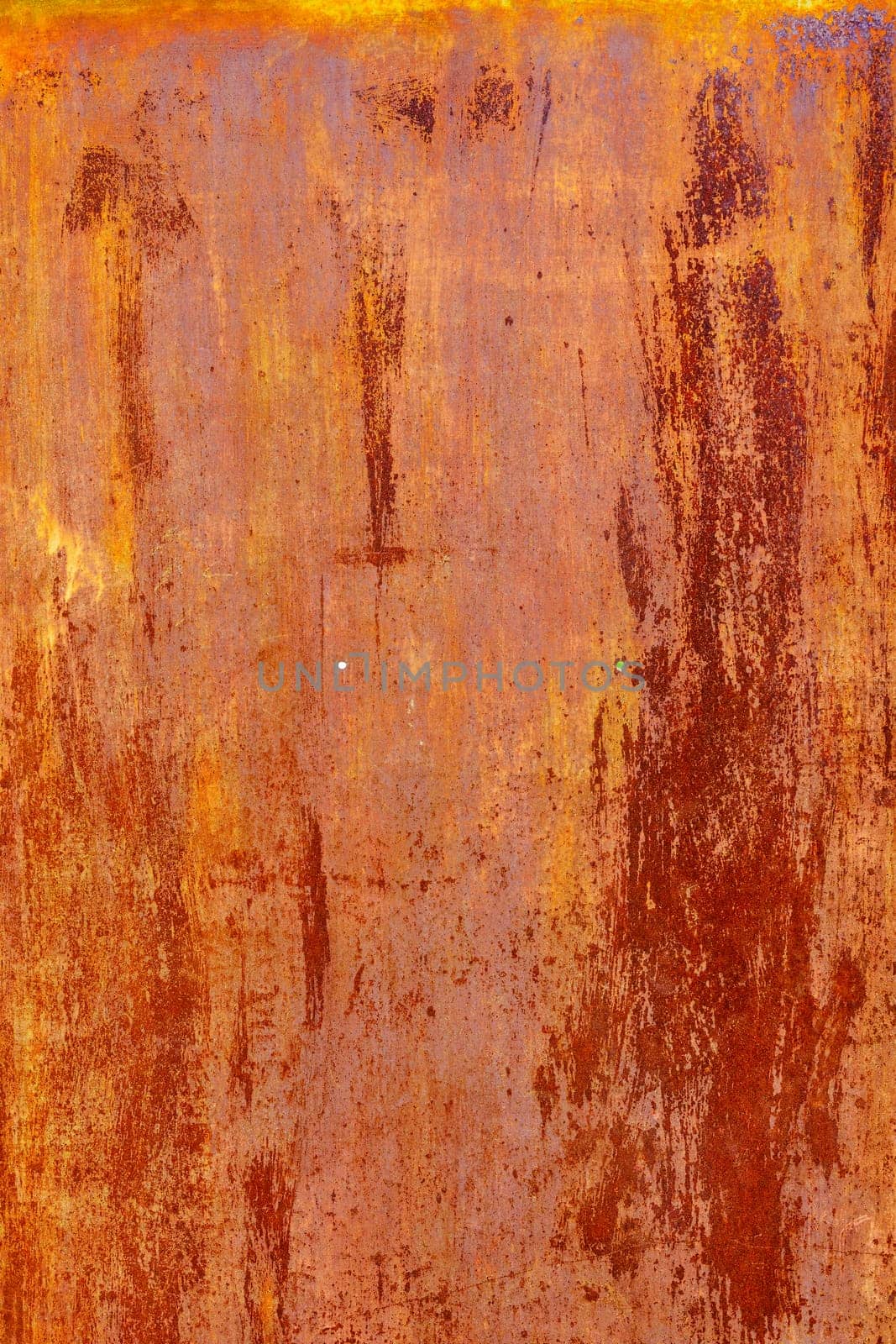 rusty flat sheet metal surface full-frame background and texture with leftovers of white paint by z1b