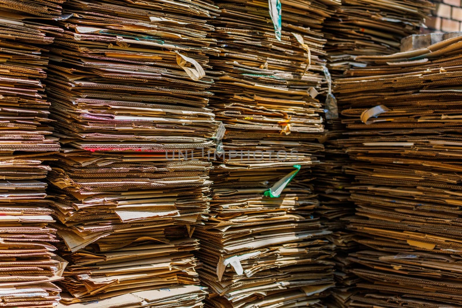 Stacks of crushed cardboard boxes, full-frame closeup background by z1b