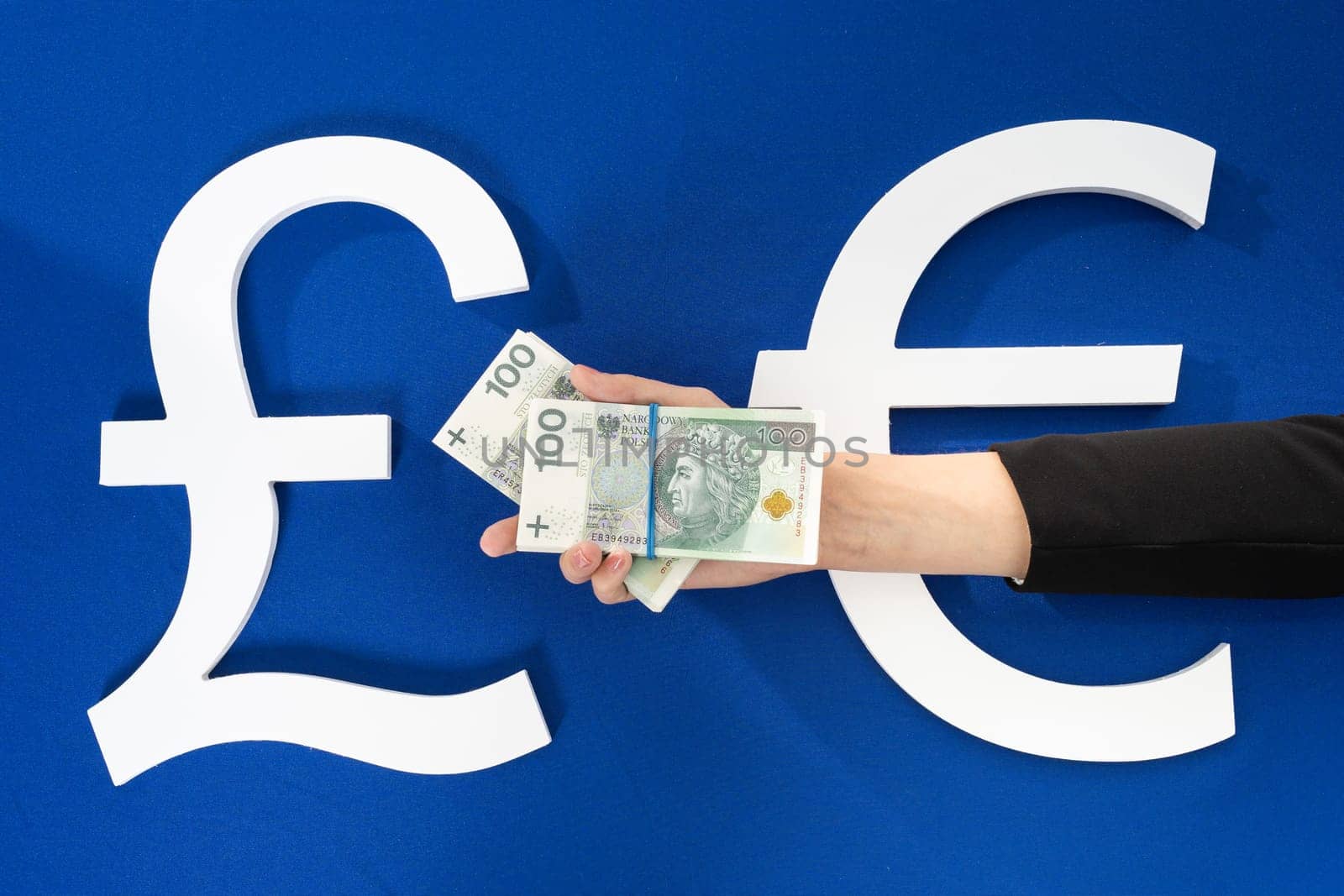 A stack of banknotes in the palm of your hand as a sign of readiness and changes in cash circulation throughout Europe.