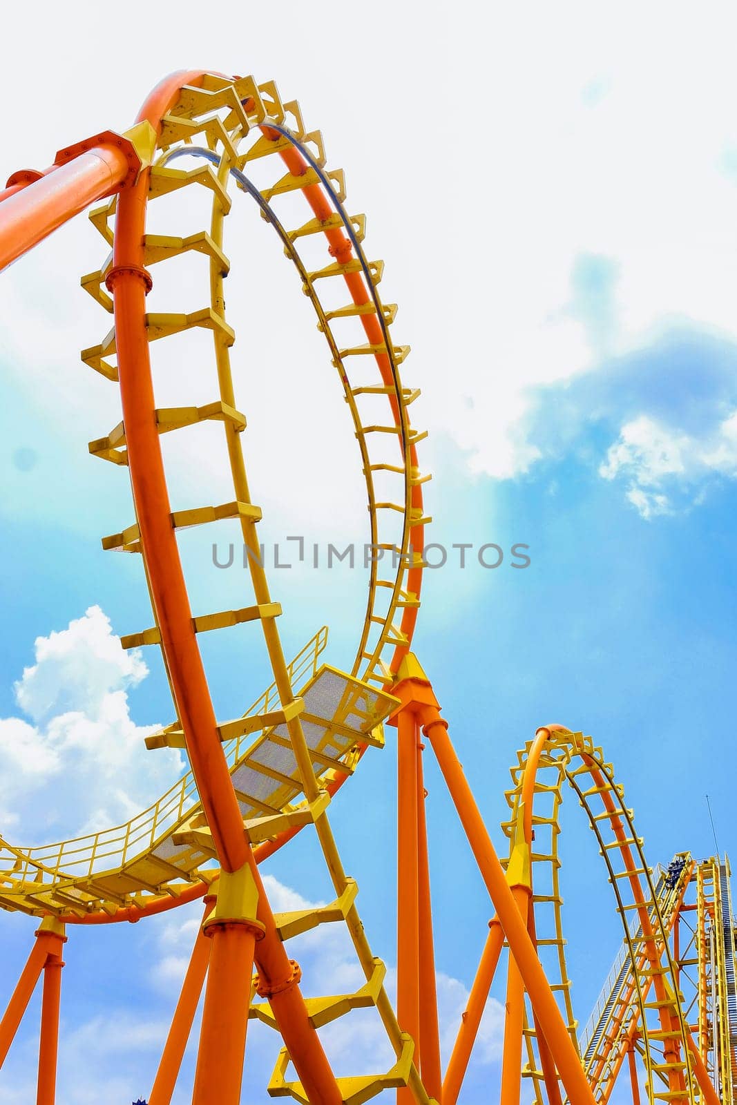roller coaster track and the blue sky by ponsulak