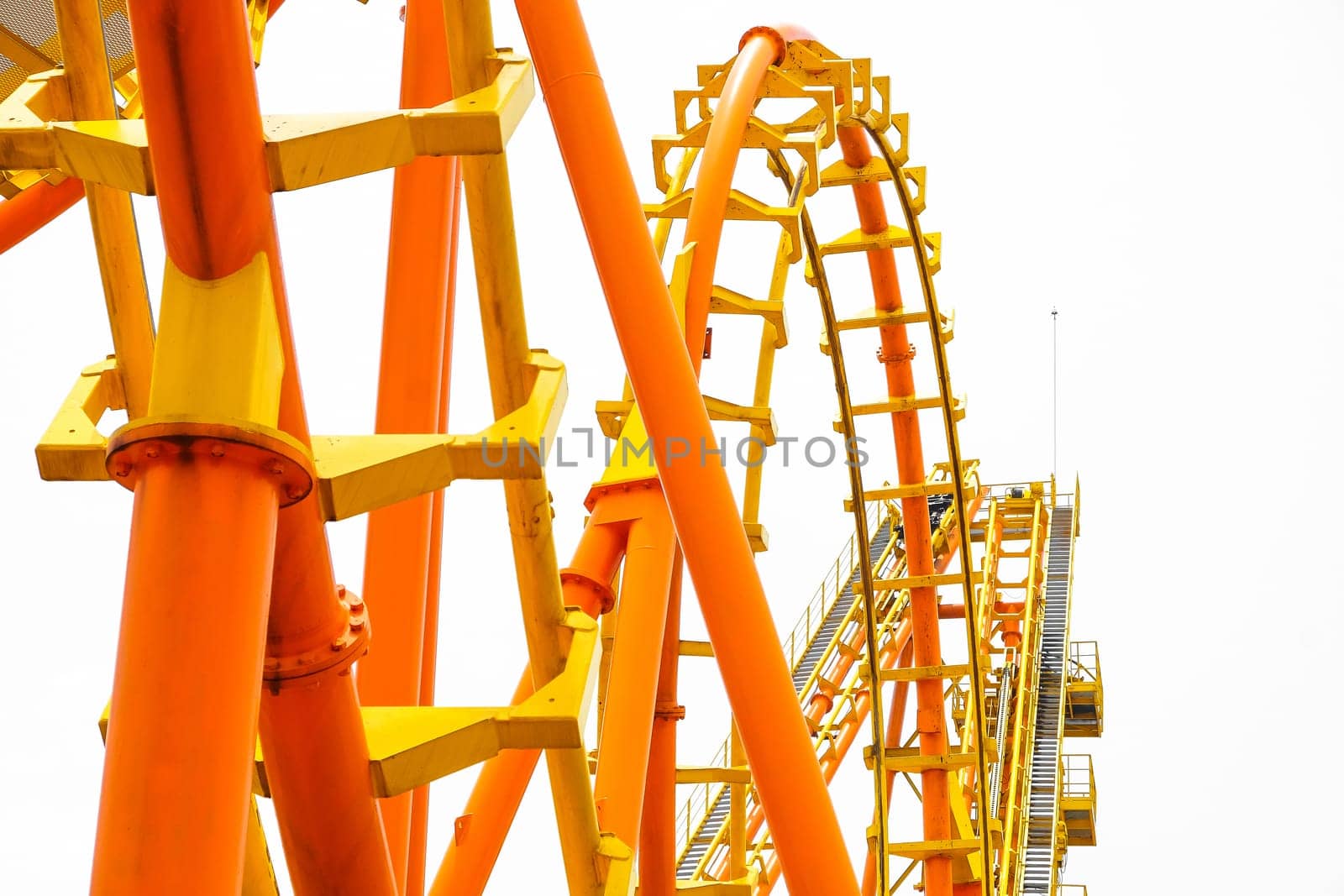 Rollercoaster on white background, closeup of photo.