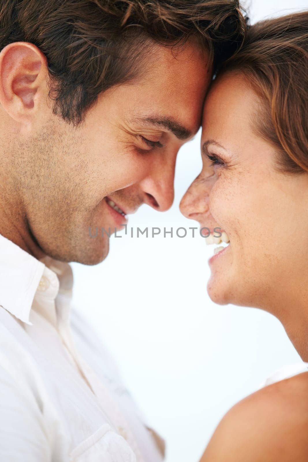 Happy couple, nose touch and love in outdoor for romantic and travel on honeymoon by sky background. Man, woman and face together for bonding with care, peace and smile for commitment in marriage.