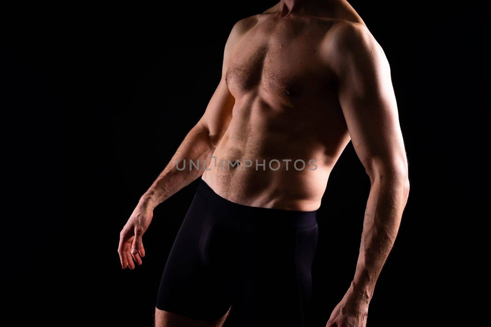 Portrait of man, bodybuilder and bicep flex in studio, background and exercise for muscular power. by Zelenin