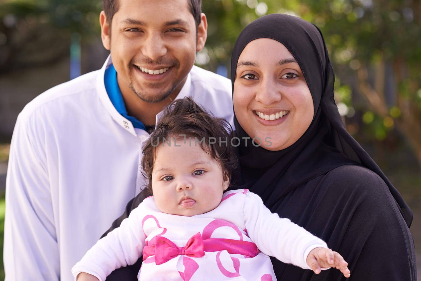 Muslim family, garden and portrait of parents with baby for bonding, relationship and outdoors together. Islam, happy and mother, father and newborn infant for love, childcare or support in park.