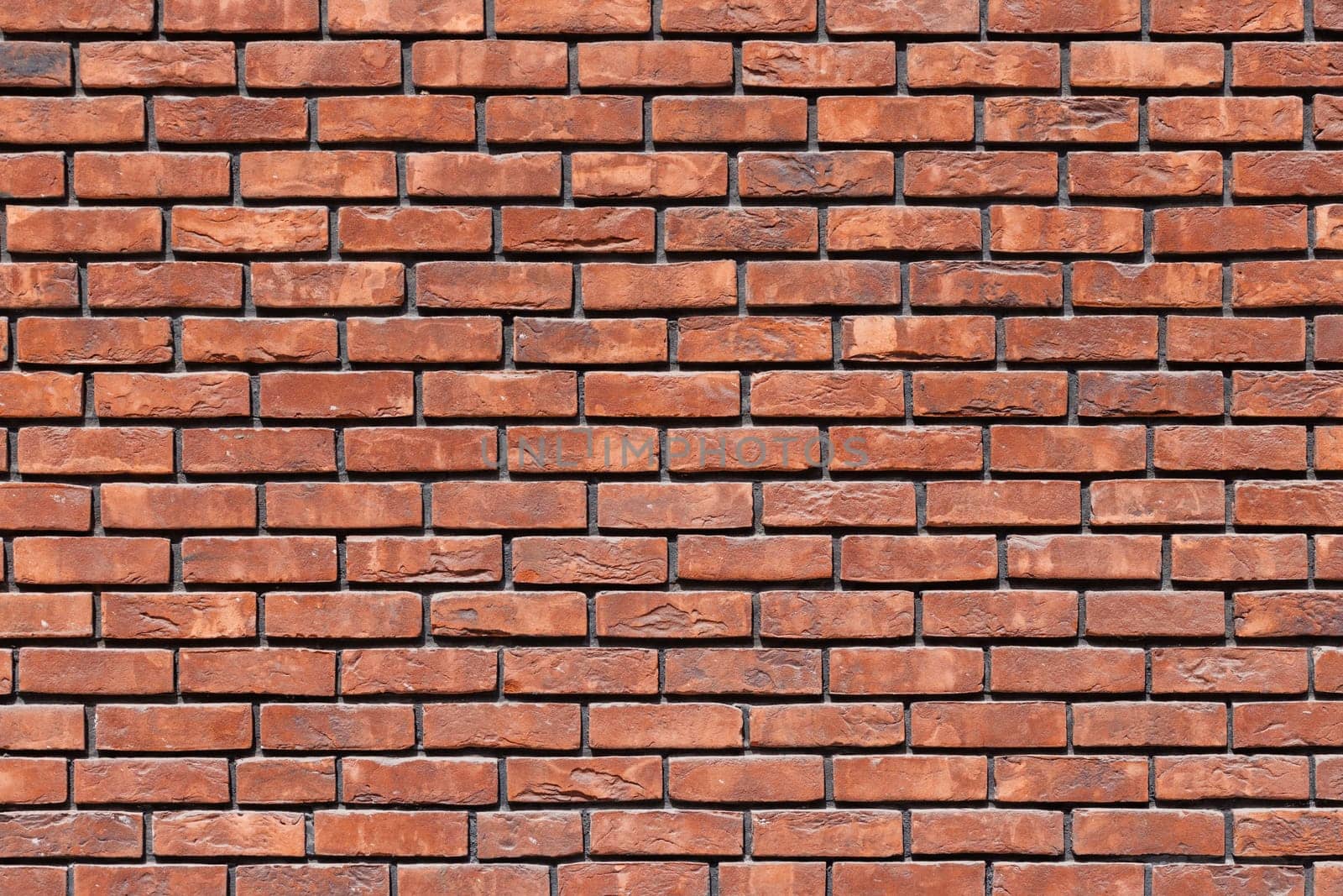 a close up of a red brick wall - full-frame background and texture by z1b