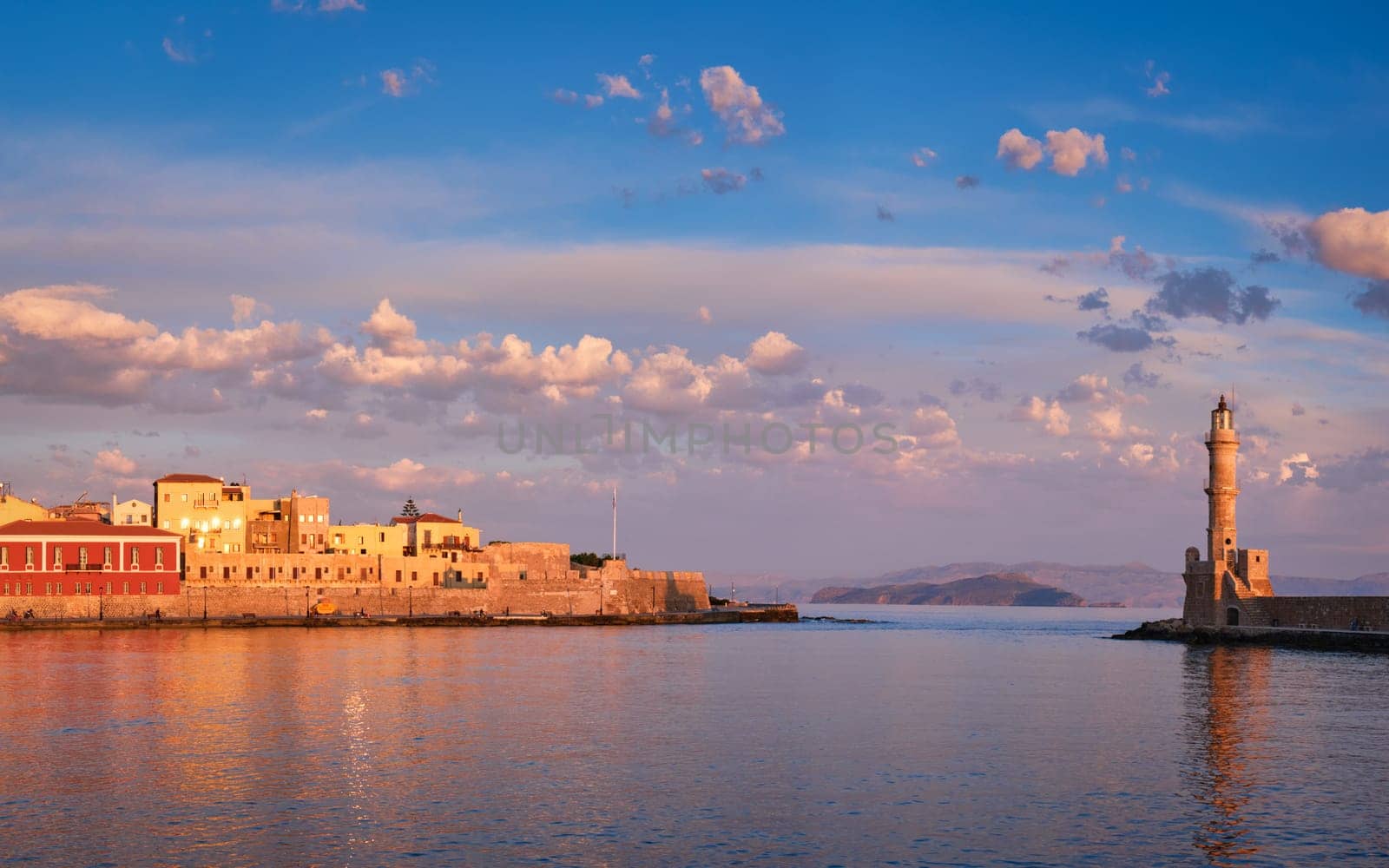 Panorama of picturesque old port of Chania is one of landmarks and tourist destinations of Crete island in the morning on sunrise. Chania, Crete, Greece