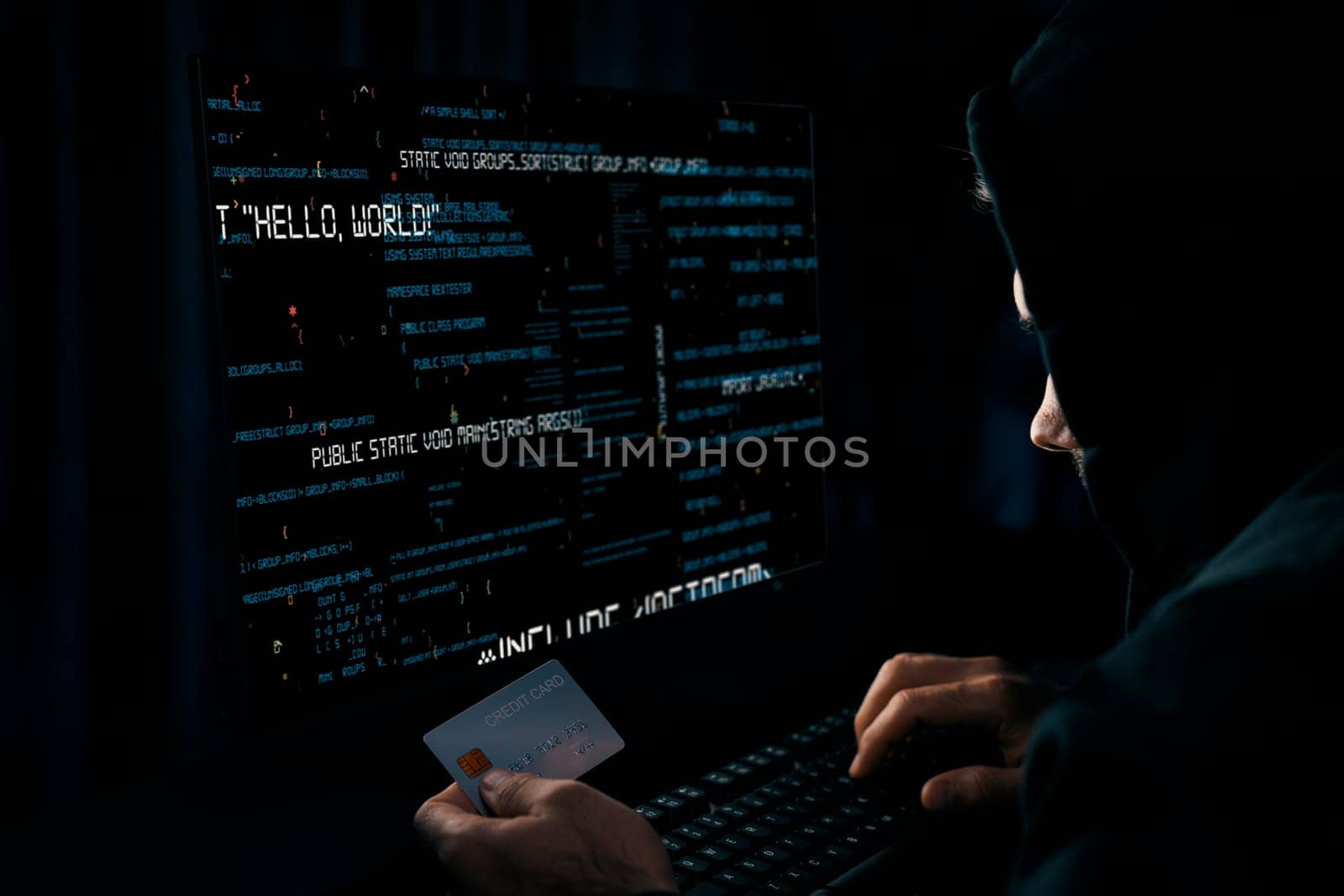 Criminal anonymous male approaching credit card of personal information database for codding encryption scam program in privacy system at night time at blue neon light room with server drive. Surmise.