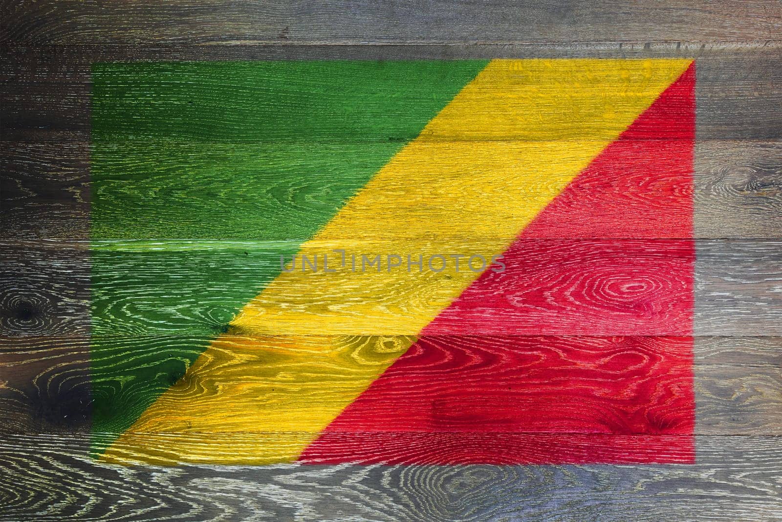 Congo flag on rustic old wood surface background by VivacityImages