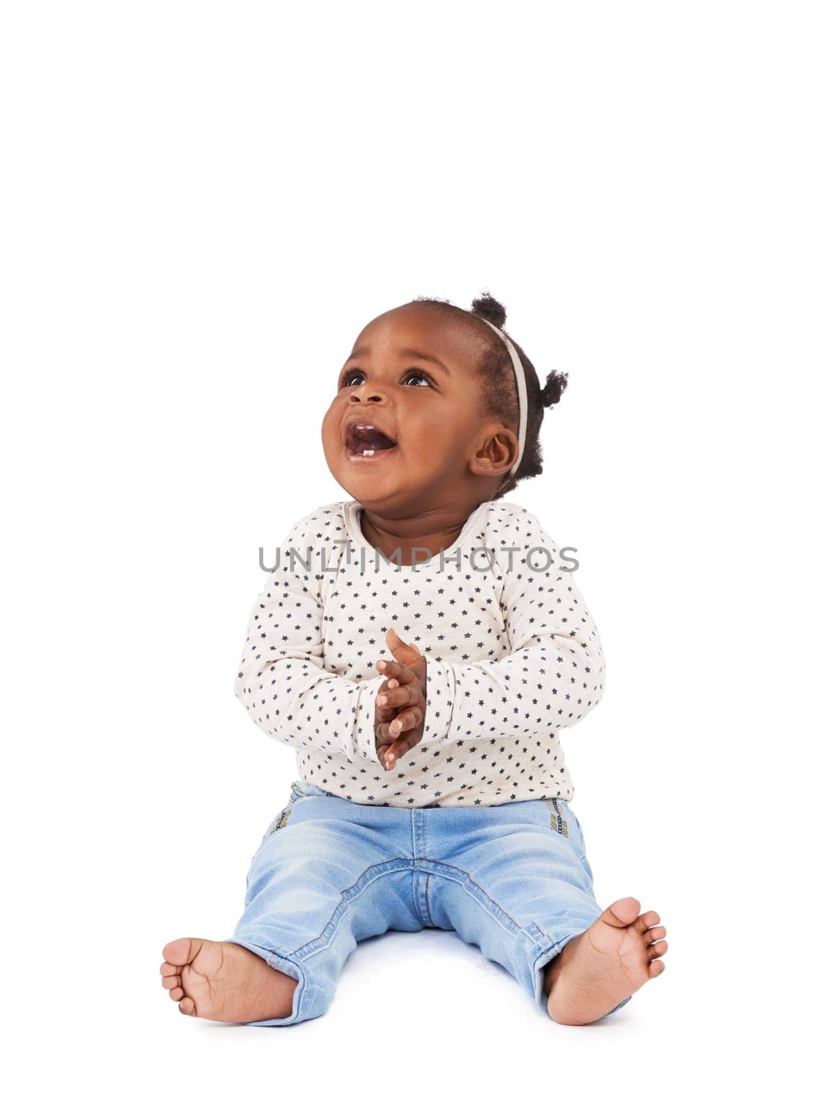 Baby girl, playing and clapping with smile in studio for applause, fun and cheerful on white background. Child, learning and motor skills for childhood development, excited and happy kid or infant by YuriArcurs