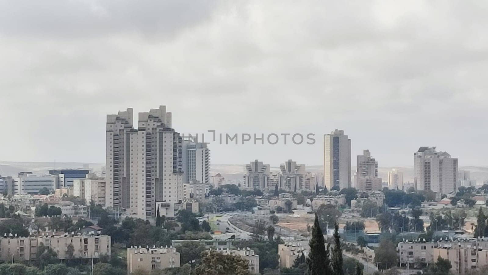 City top view, landscape blue gray light sky nature white clouds whether background . High quality photo