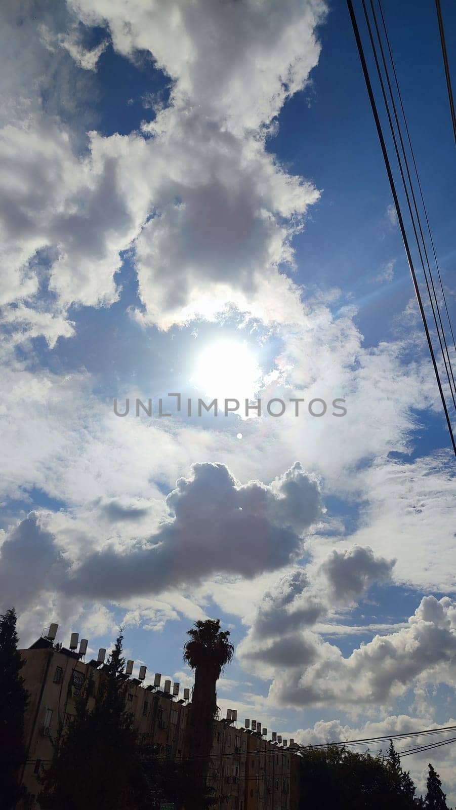 City top view, landscape blue gray light sky nature white clouds whether background . High quality photo