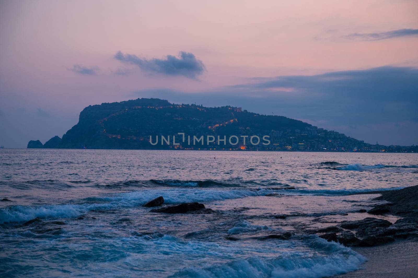 Beautiful night scene on Alanya beach in Turkey