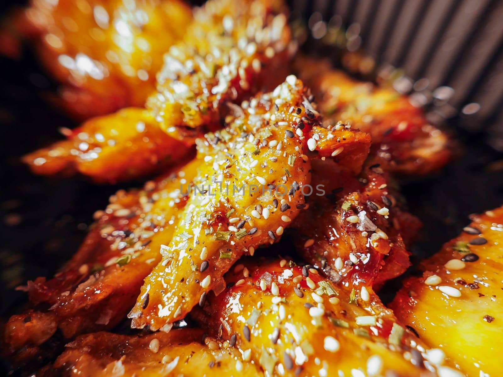 Korean Chicken wings with sauce. 치킨. Traditional oriental food.