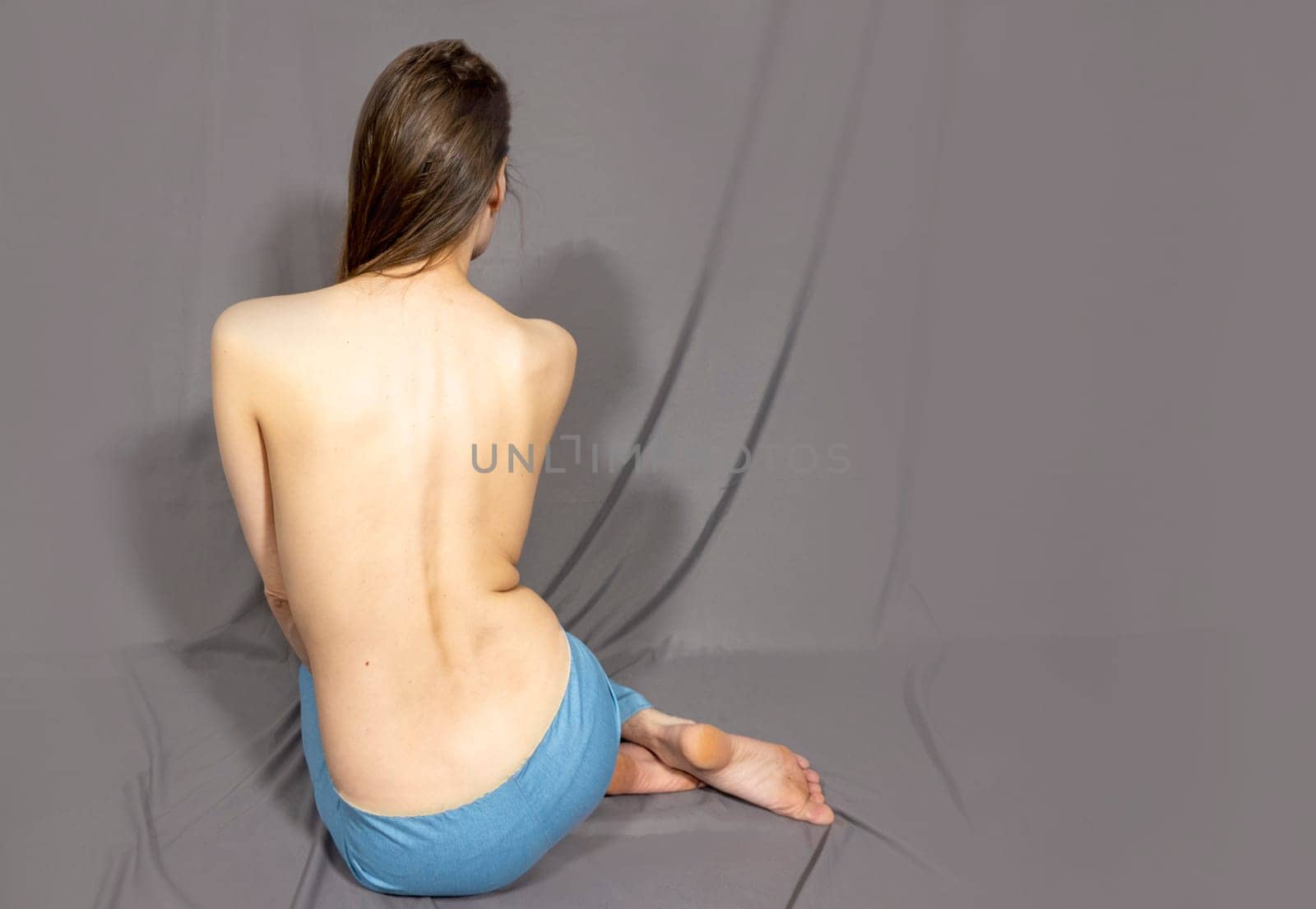 The beautiful woman's body on gray background by kajasja