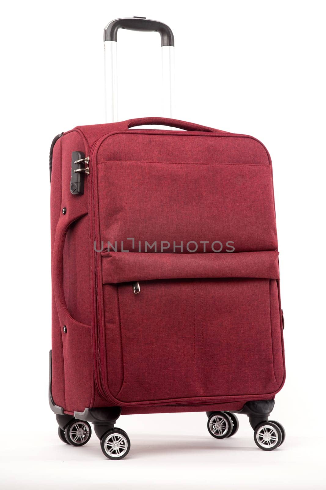 Travel red suitcase isolated on white background.