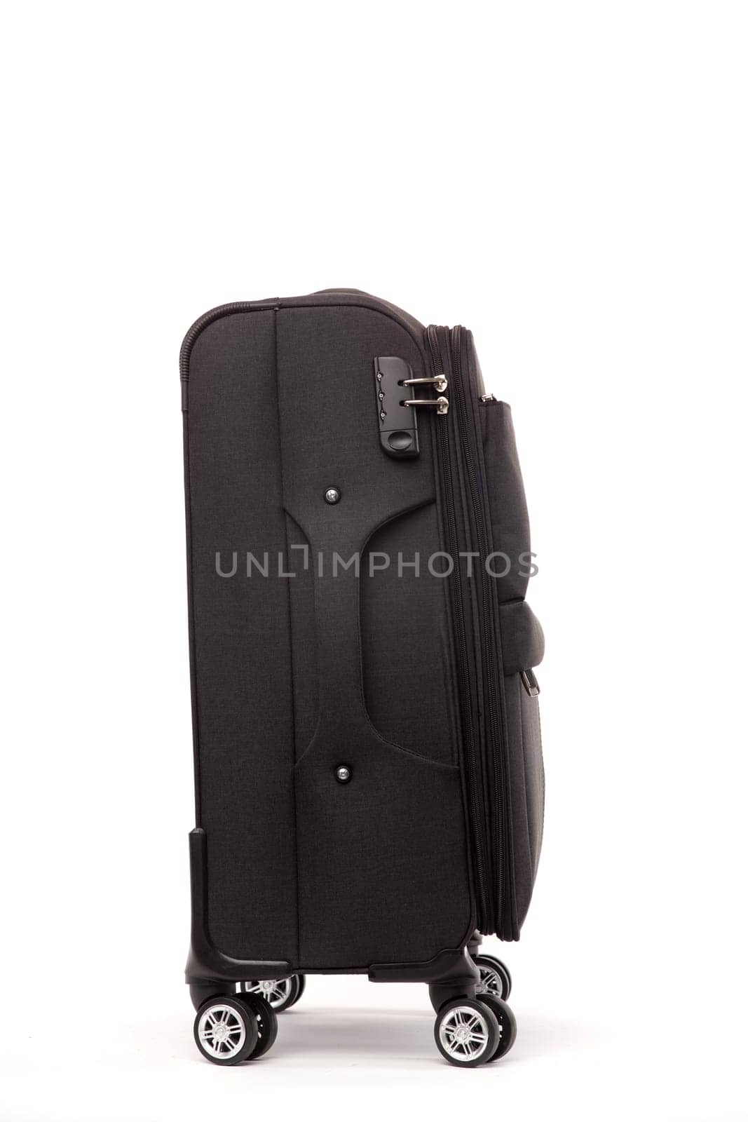 Travel black suitcase isolated on white background by zartarn