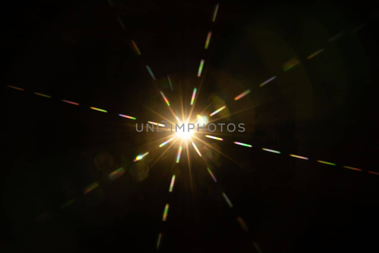 Abstract sun flare. The lens flare is subject to digital correction by zartarn