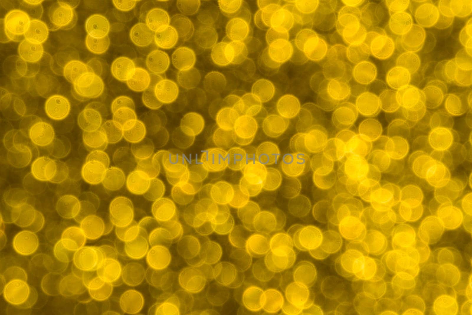 Abstract christmas lights glitter background. christmas gold texture background.