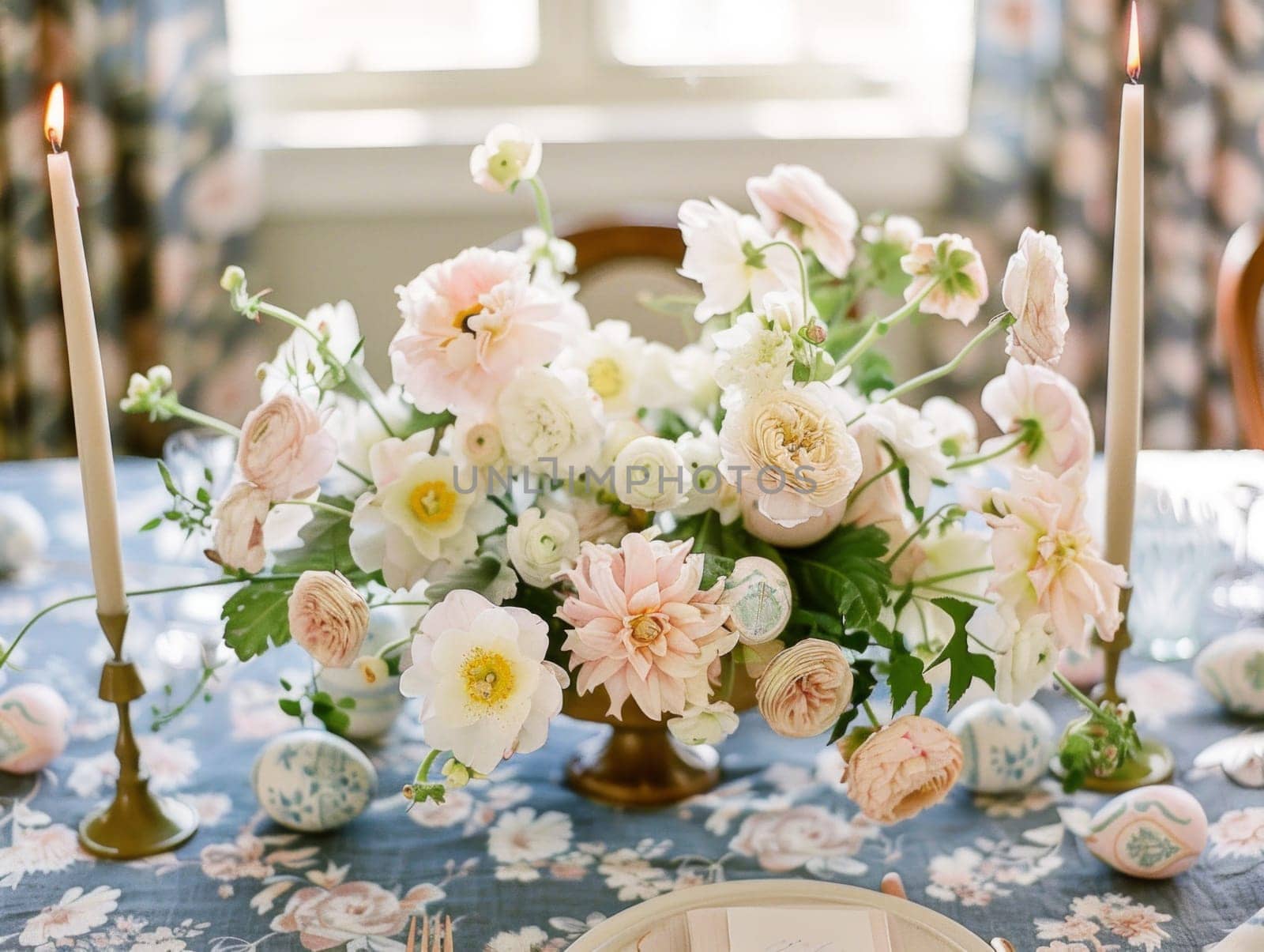 A beautiful vase filled with a variety of white and pink flowers sits gracefully on top of a table, adding a touch of sophistication to the room.
