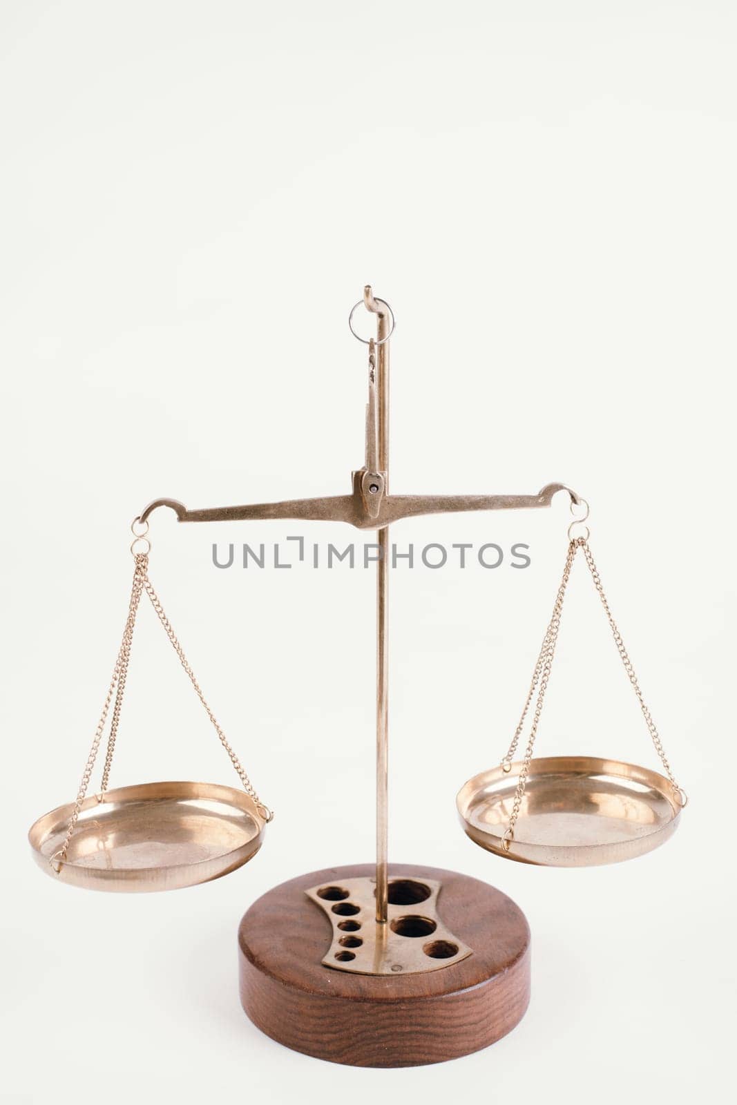 Gold brass balance scale isolated on white background. Sign of justice, lawyer