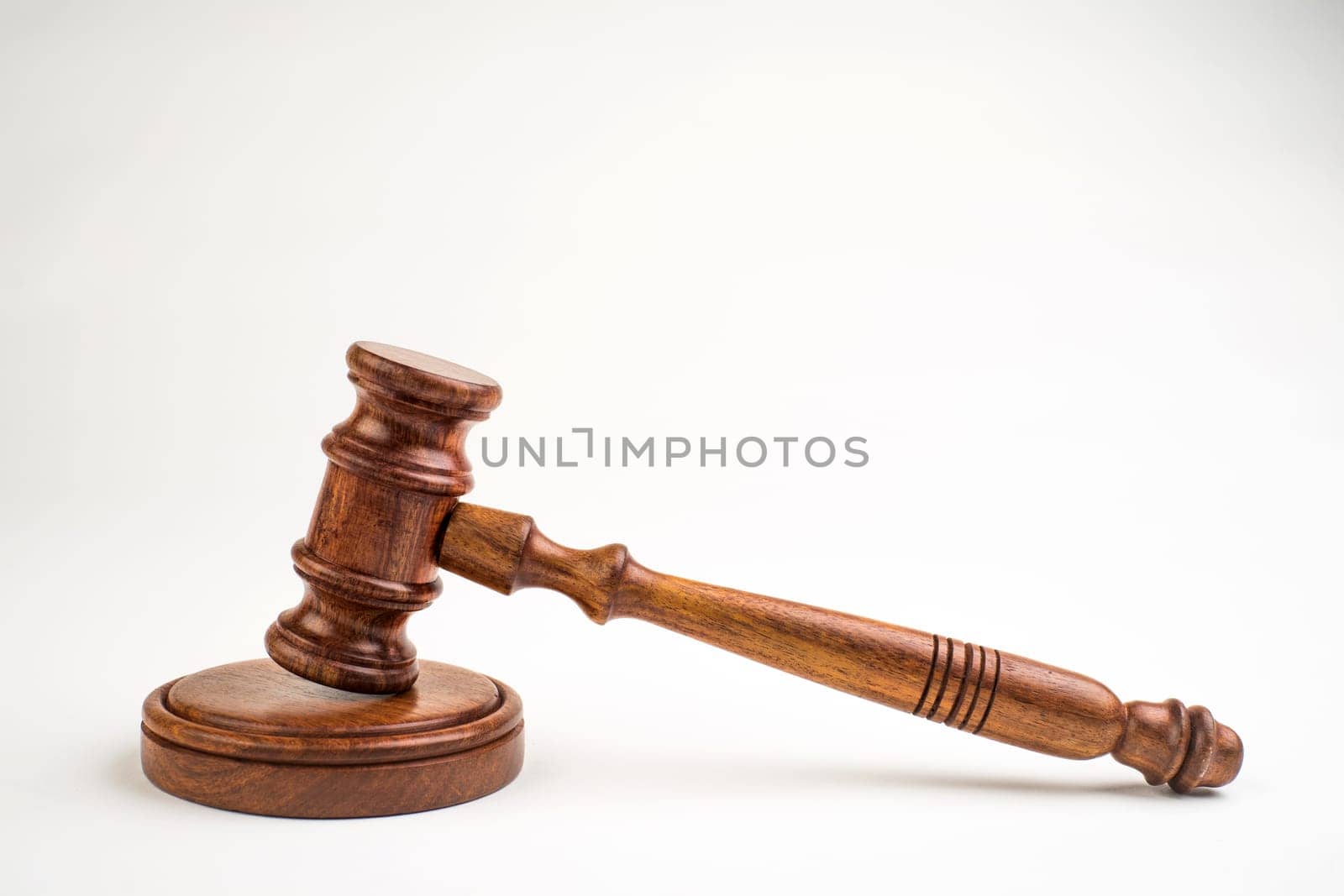 Judge's gavel on light background, top view. Law concept.