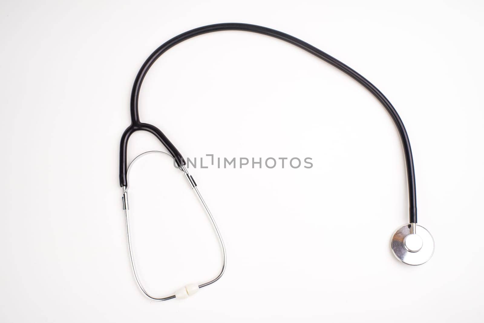 Stethoscope isolated on white, top view. Medical tool.