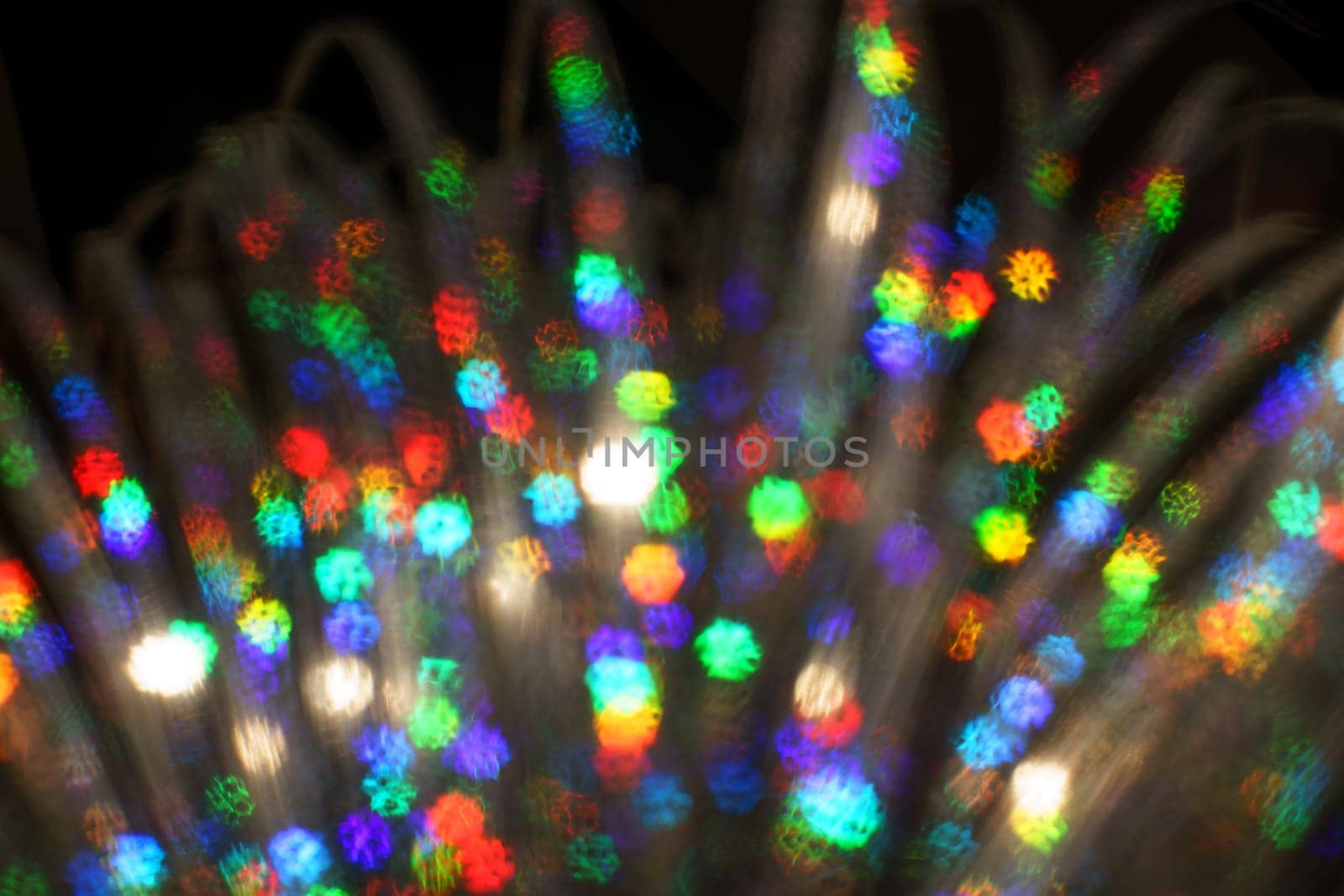 Christmas background. Festive abstract background with bokeh defocused lights and stars by zartarn