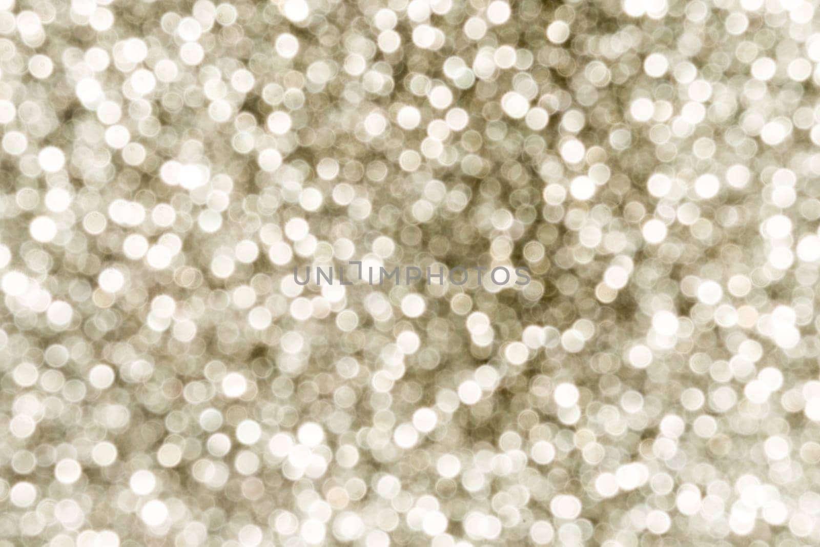 Silver Sparkling Lights Festive background with texture. Abstract Christmas twinkled bright bokeh defocused and Falling stars. Winter Card or invitation