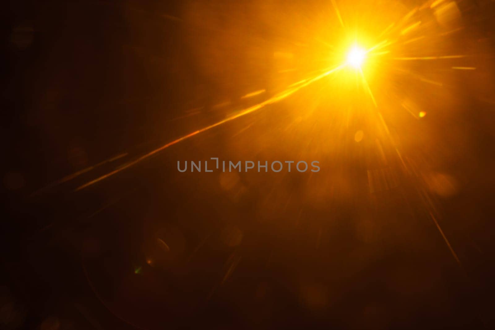 Abstract imitation sun starlight distant galaxy on a black background. -image