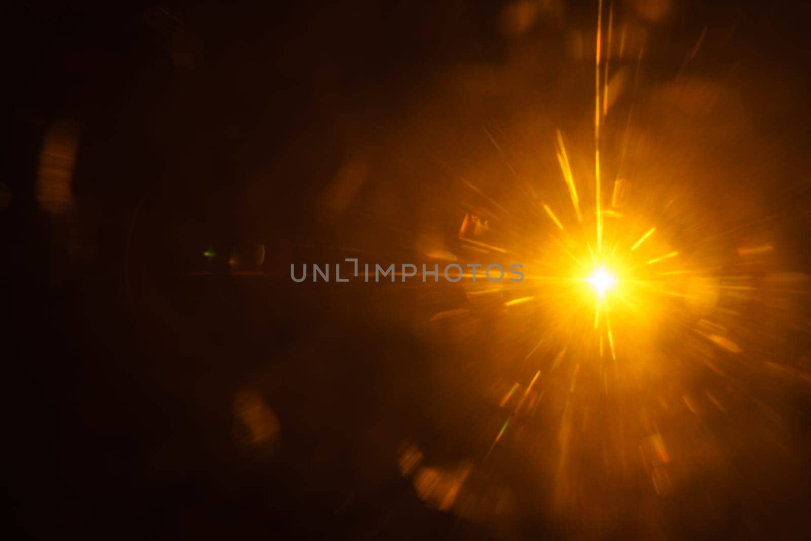 Abstract imitation sun starlight distant galaxy on a black background. -image